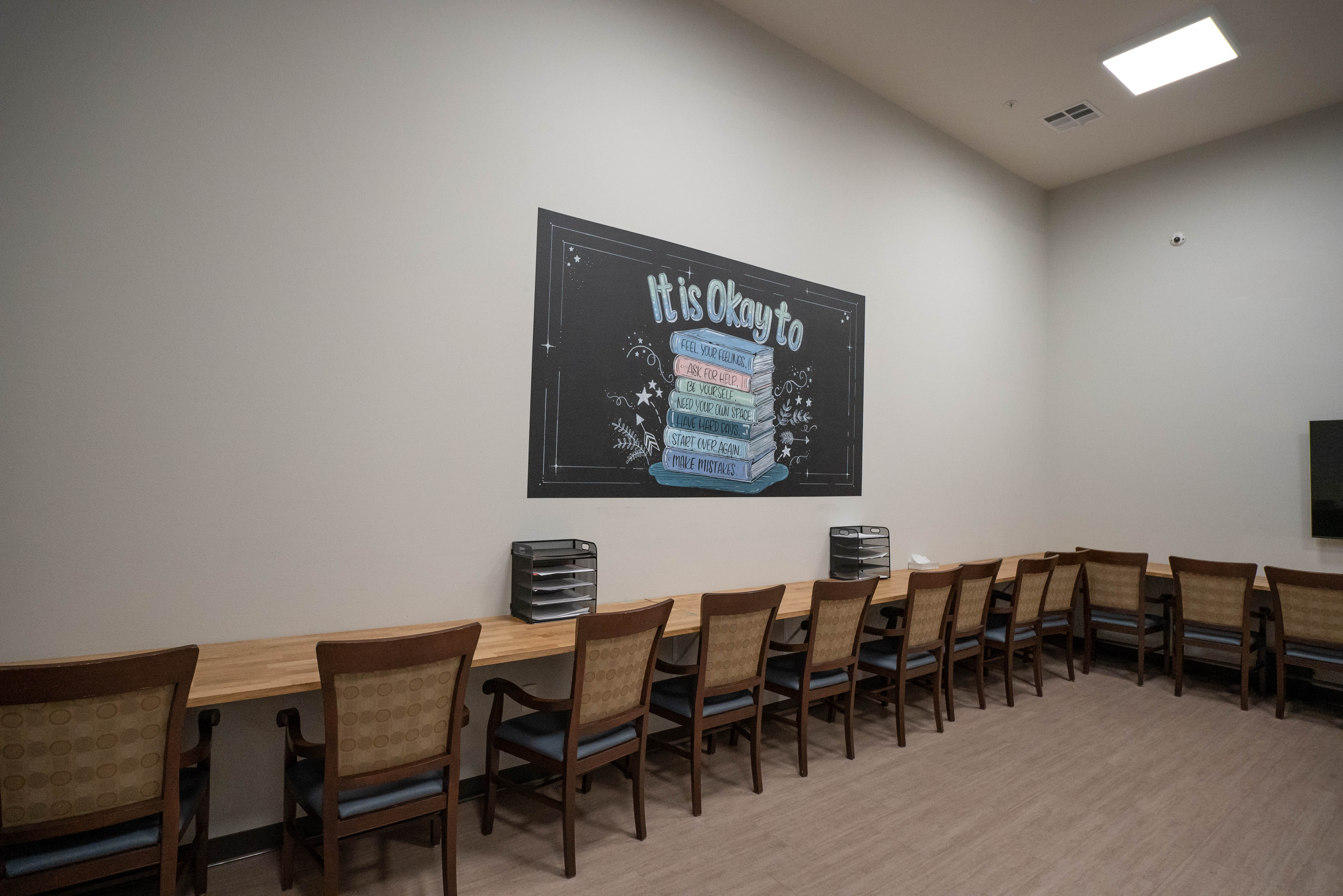 Silver State Youth Academy classroom with student desks and mural